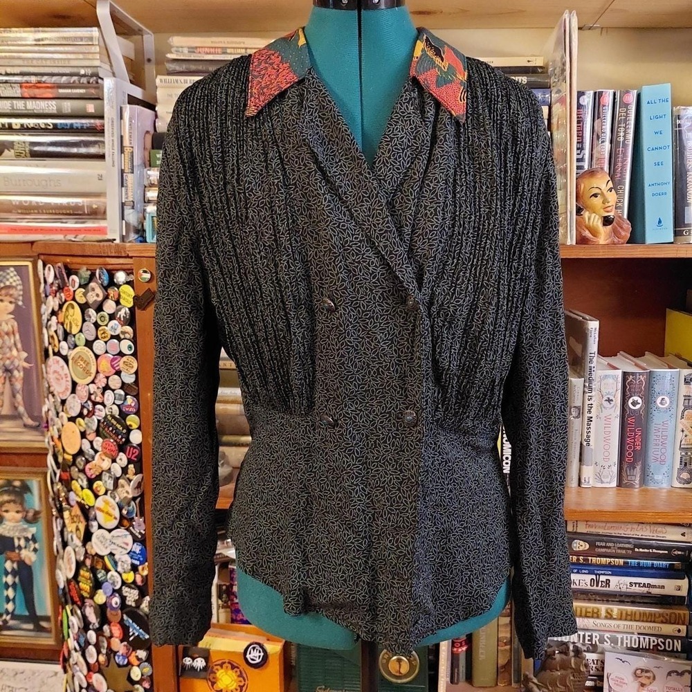 Vintage‎ green and black leap pattern with a orange patterned collar button top.